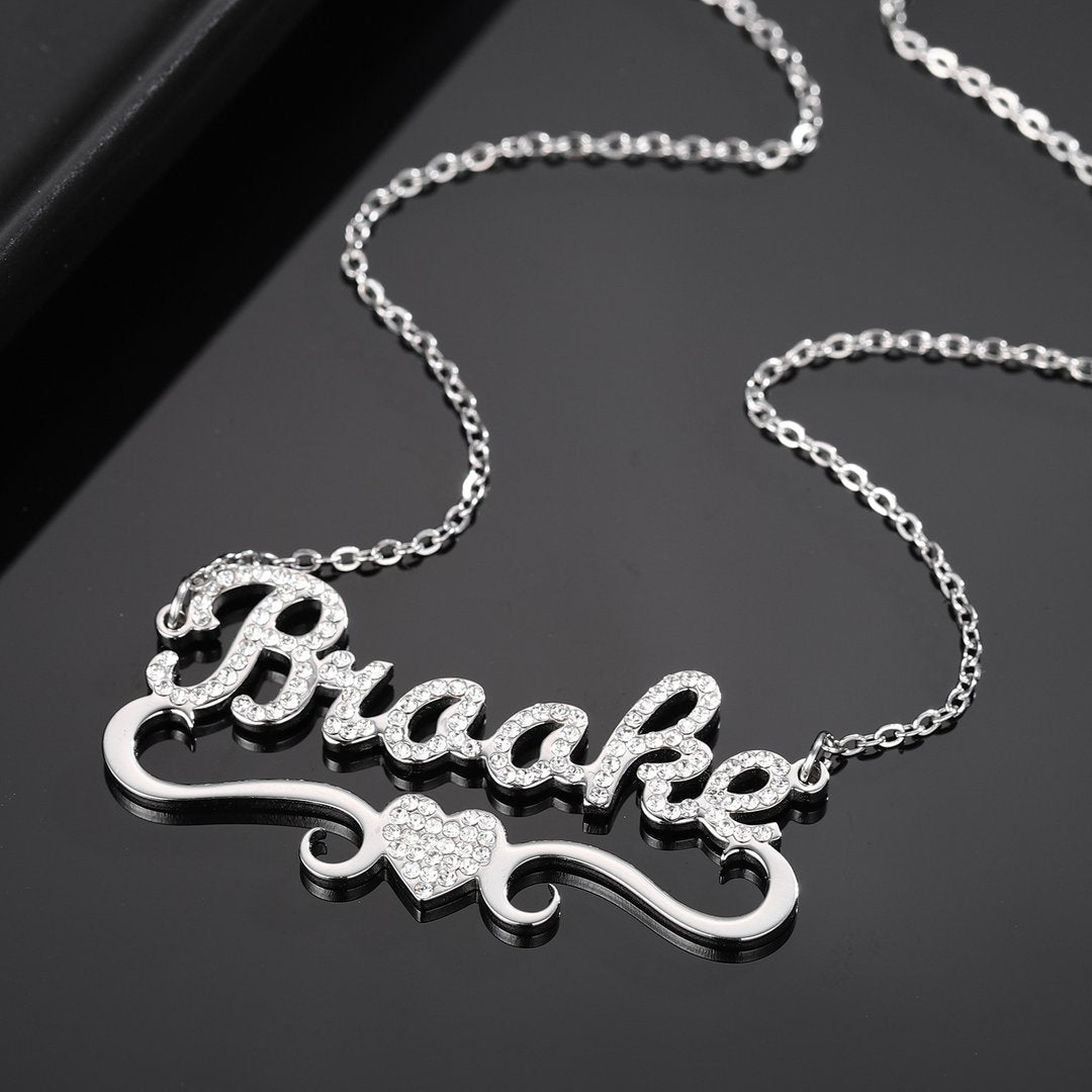 The Rich History of Name Necklaces by DORADO