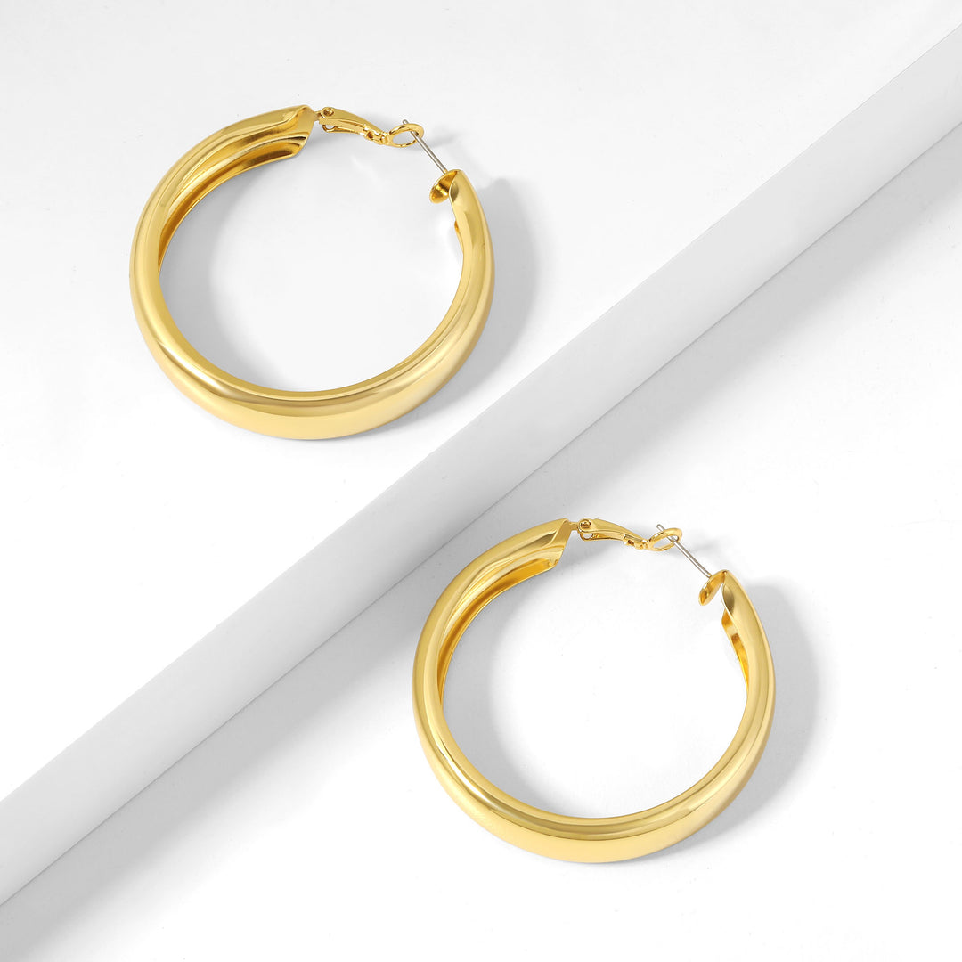Chunky Hollow Hoop Earrings | Earrings by DORADO
