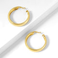 Chunky Hollow Hoop Earrings | Earrings by DORADO