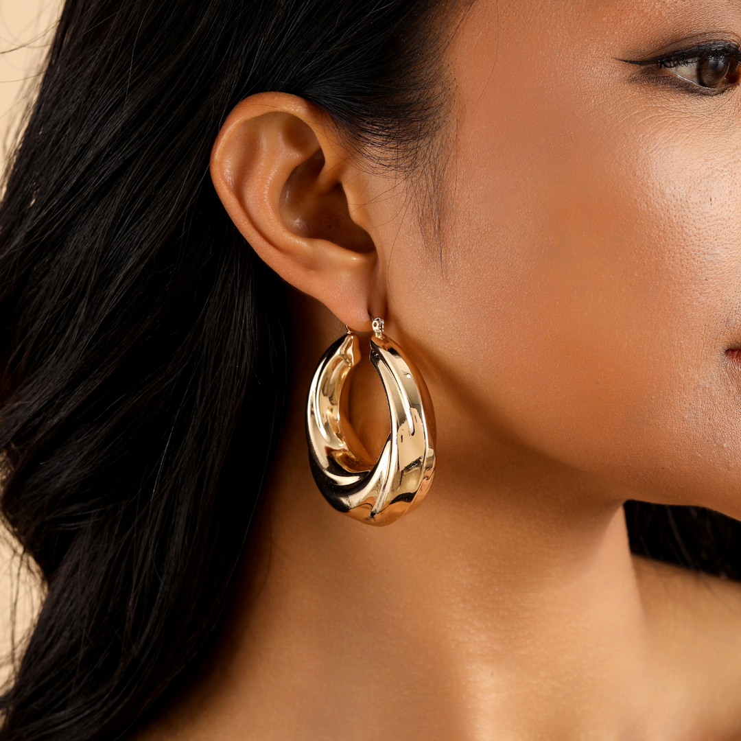 Round Twisted Hoop Earrings | Earrings by DORADO
