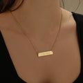 Embossed Engraved Bar Necklace | Necklaces by DORADO