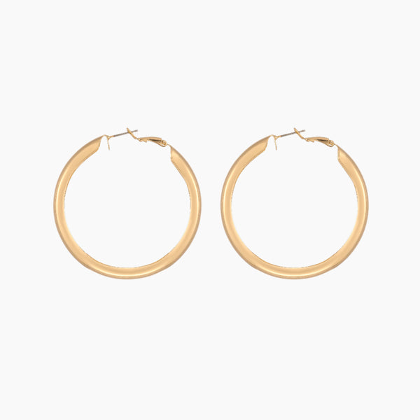 Chunky Hollow Hoop Earrings | Earrings by DORADO
